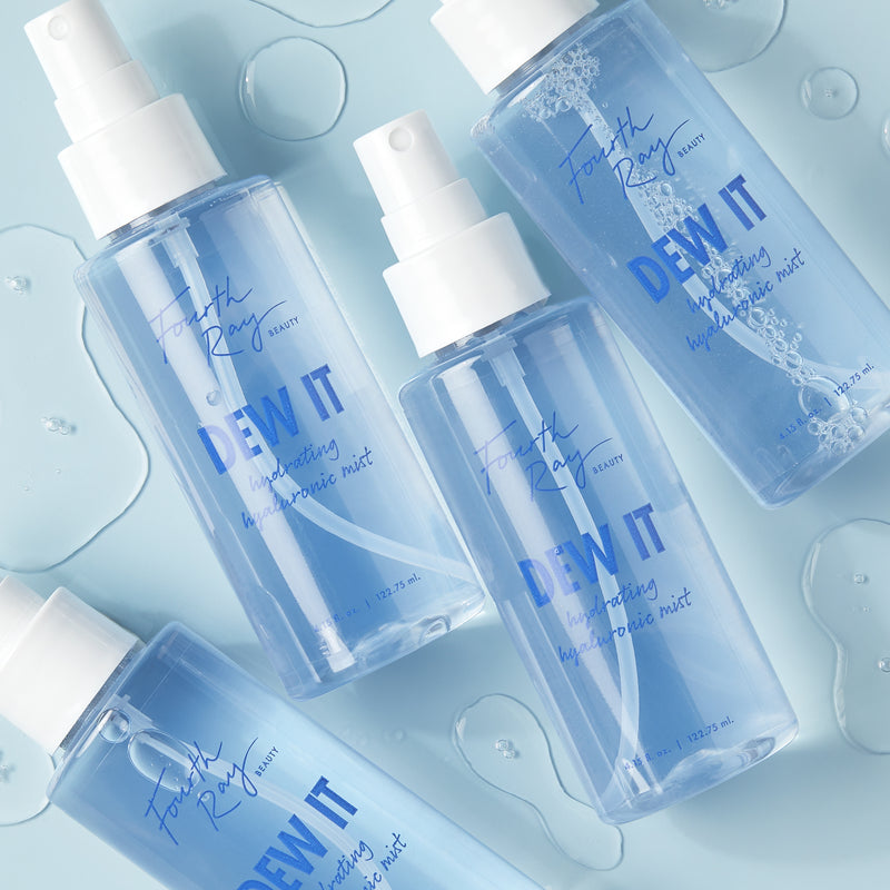 DEW-IT Hydrating Hyaluronic Mist bottles with droplets of water